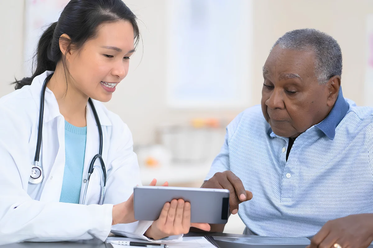 Doctor discussing glaucoma treatment and recovery with a patient